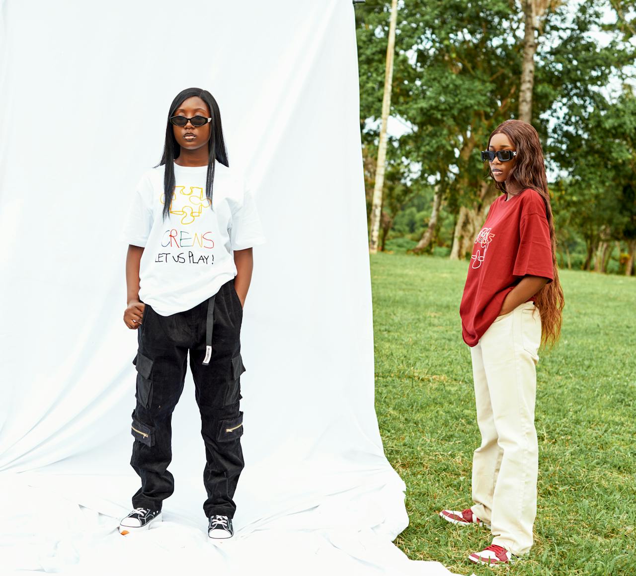 Two models pose in stylish outfits against a white backdrop set outdoors.